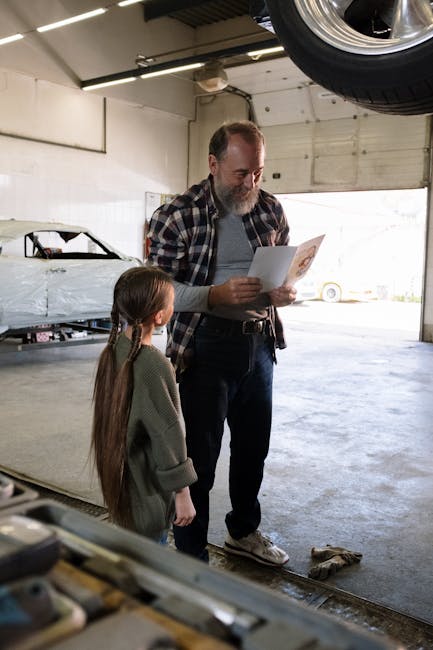 Father and daughter sharing a moment in a garage, embodying love and family time.
